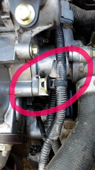 【图】长安悦翔2009款发动机图片红圈处漏液