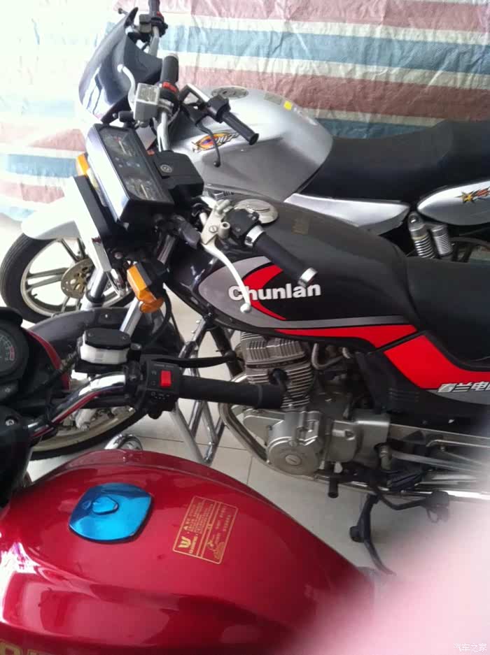 谁知道春兰豹125双缸电喷有图有真相