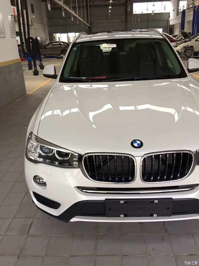 宝马x3后驱版矿石白提车作业